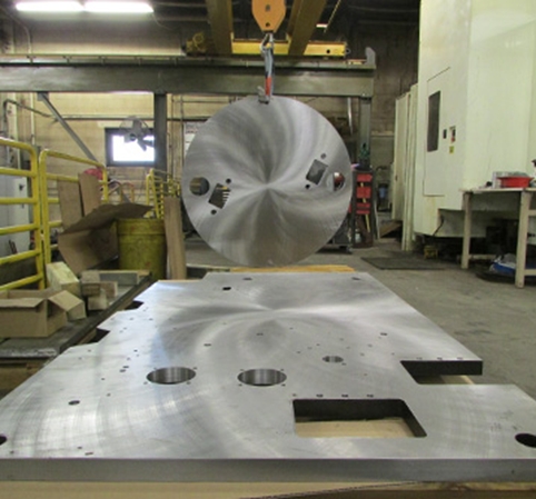 Here is an example of our large custom cnc machining capability with a large piece of stainless steel.